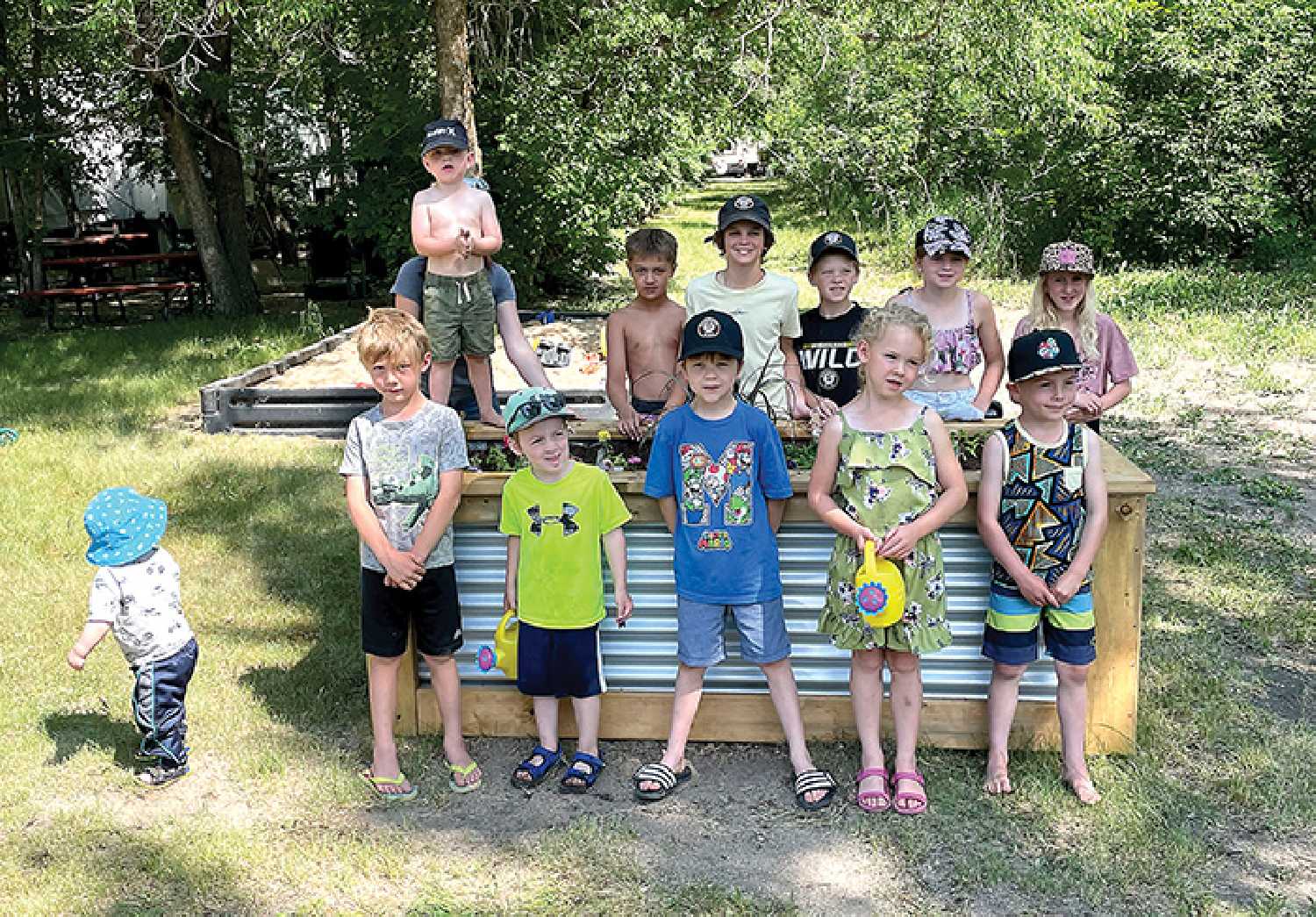 Kids whose families stay at the regional park planted flowers of their own at the newly added flower gardens, and will be responsible for taking care of them throughout summer to help contribute to the park’s beautification.